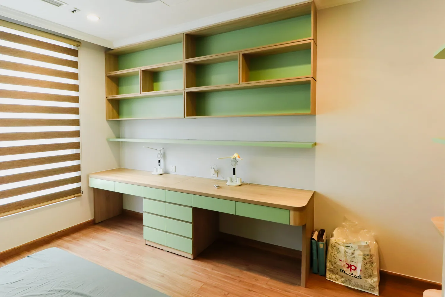 Custom solid wood desk and storage designed for a home office