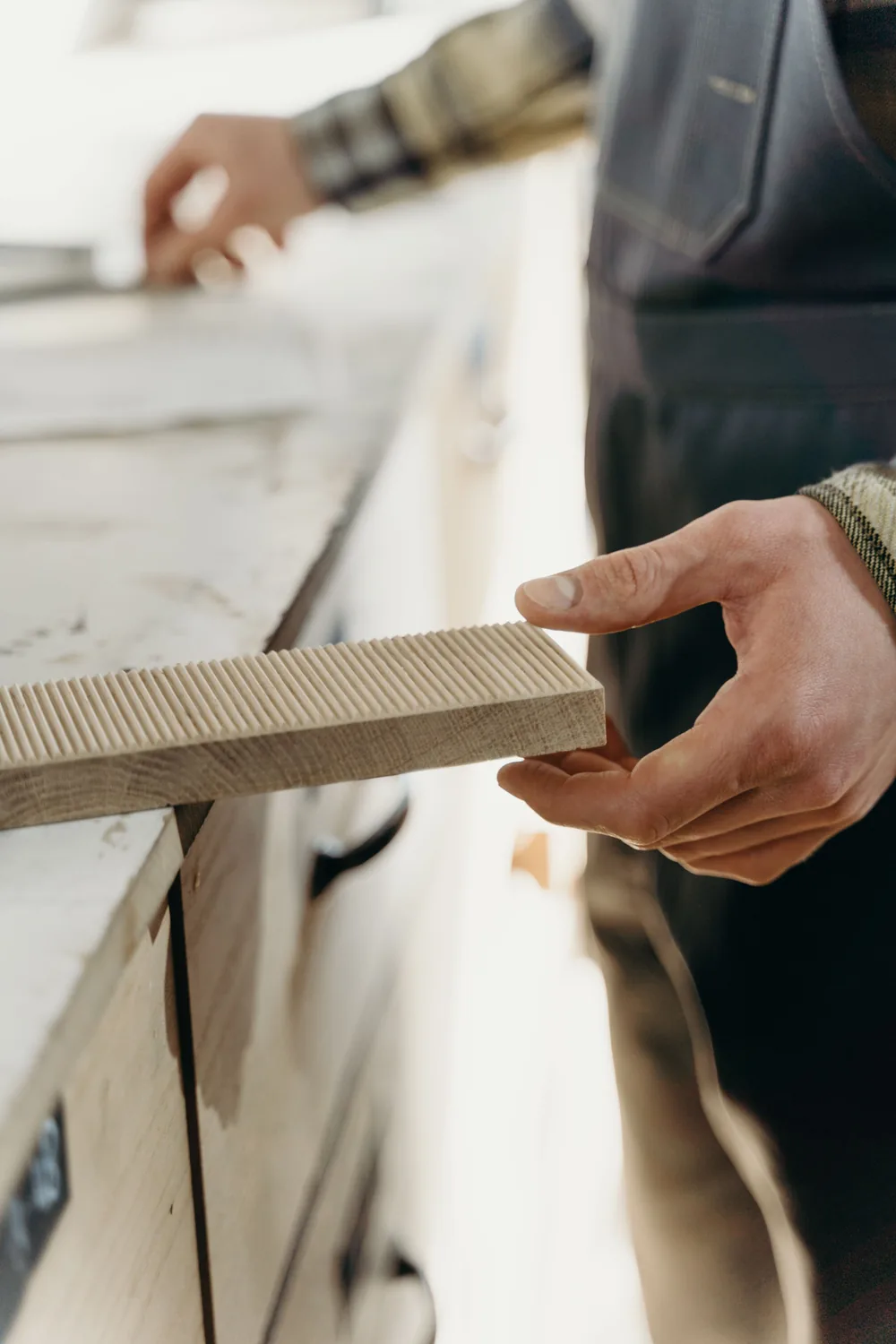Close view of a carefully finished live-edge solid wood furniture detail