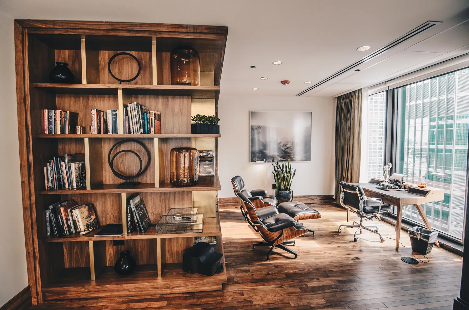 Solid wood bookshelf and work area in a home office setting